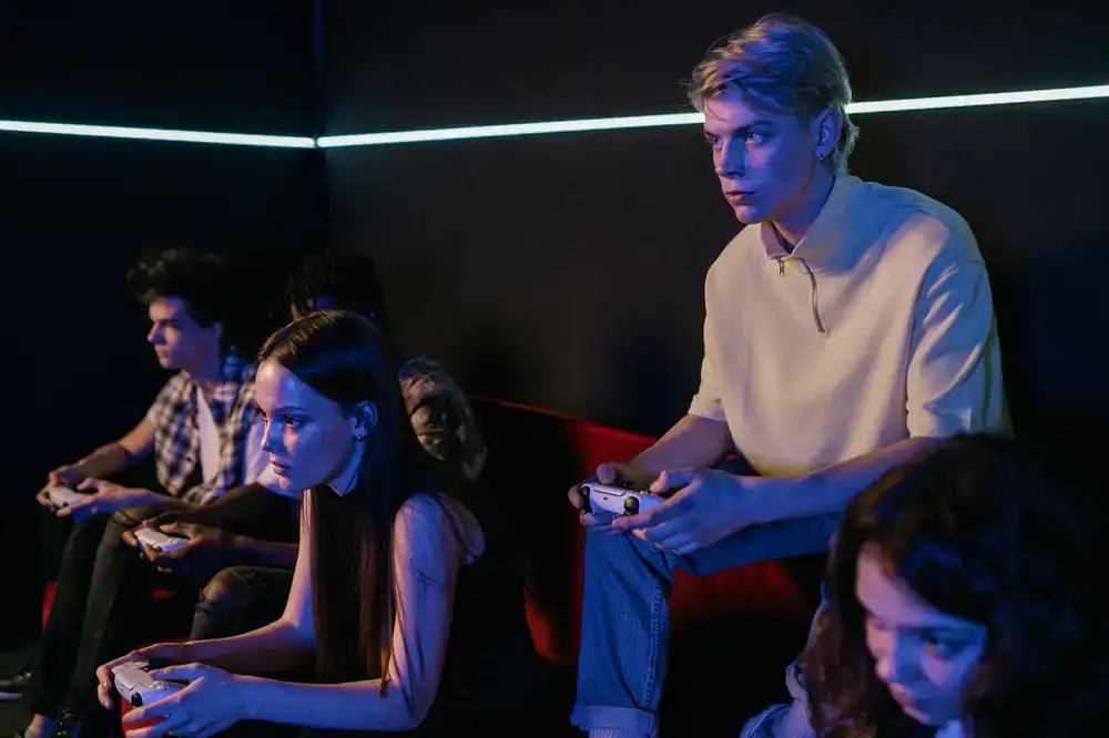 Group of friends playing a rhythm dance game